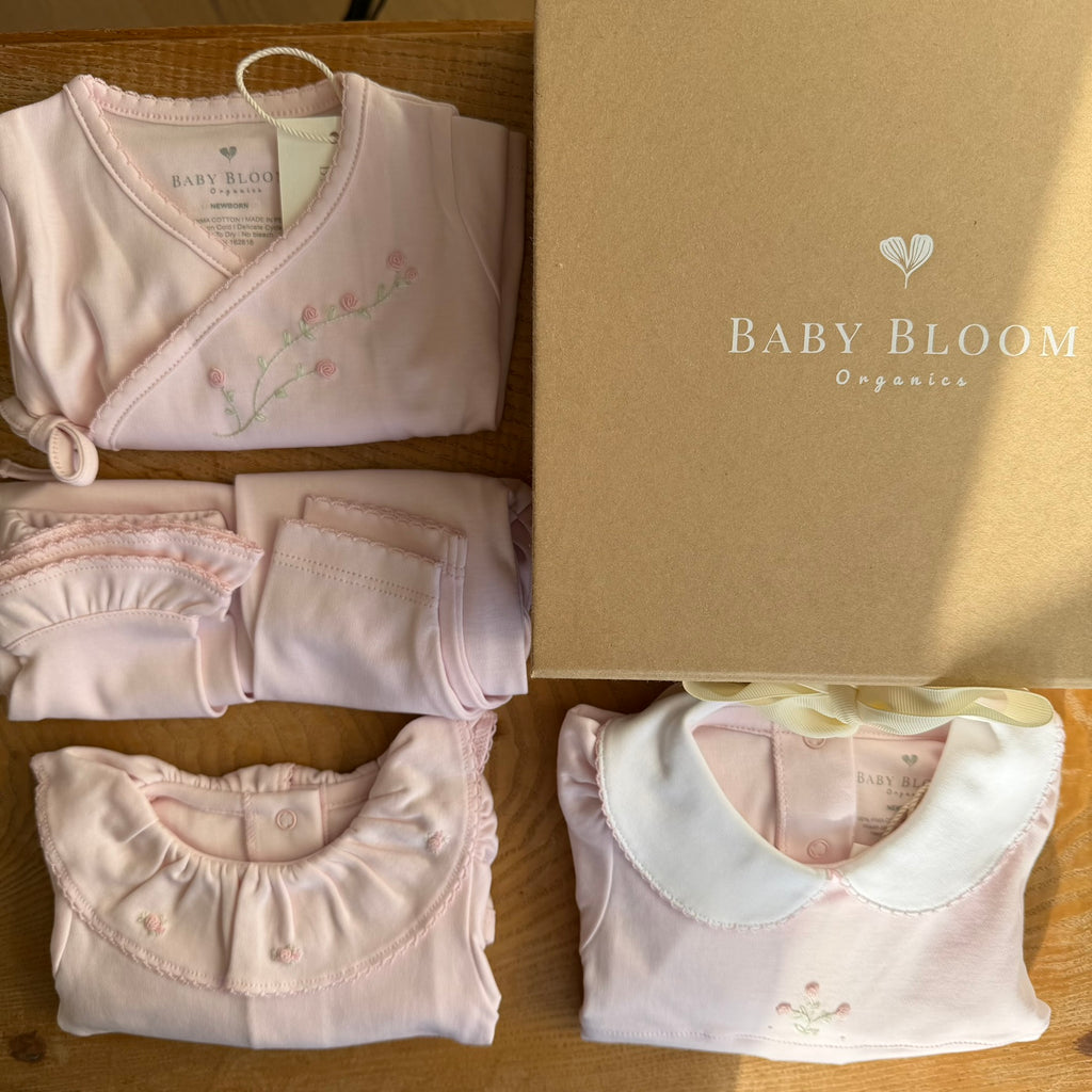 Baby girl gift set with hand-embroidered rose details in Peruvian Pima cotton